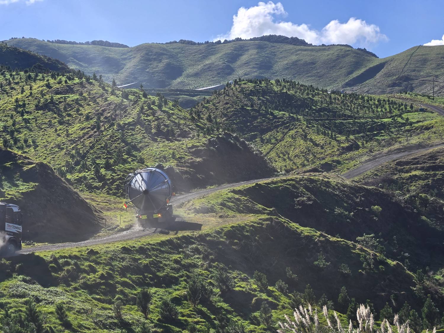 Aerial view of farm tracks winding through the Rawhiti hill country